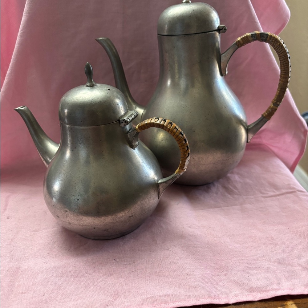 CK Tiel Holland Pewter Teapots with Woven brown handles.
